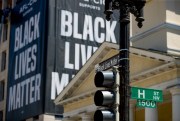 A Black Lives Matter banner hangs from the AFL-CIO building near Black Lives Matter Plaza, close to the White House, Washington, June 12, 2020 (AP photo by Andrew Harnik).