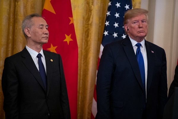 President Donald Trump and Chinese Vice Premier Liu He before signing a U.S. China trade agreement, in the East Room of the White House, Washington, Jan. 15, 2020 (AP photo by Evan Vucci).
