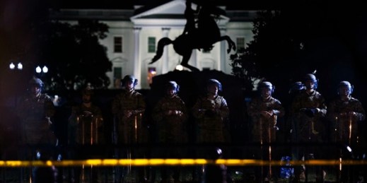 Police form a line in Lafayette Park, in front of the White House, as demonstrators gather to protest the death of George Floyd, Washington, June 2, 2020 (AP photo by Evan Vucci).
