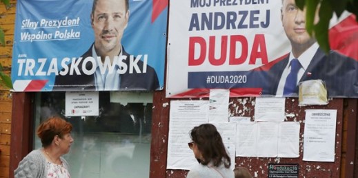 Campaign posters for two contenders in Poland’s presidential election runoff, the conservative incumbent, Andrzej Duda, and his liberal rival, Warsaw mayor Rafal Trzaskowski, in Raciaz, Poland, July 9, 2020 (AP Photo by Czarek Sokolowski).