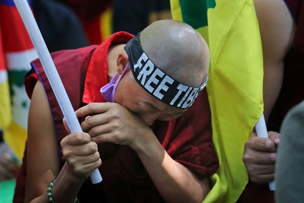 An exiled Tibetan breaks down during a march to mark the 60th anniversary of the 1959 Tibetan uprising, in New Delhi, India, March 10, 2019 (AP photo by Manish Swarup).