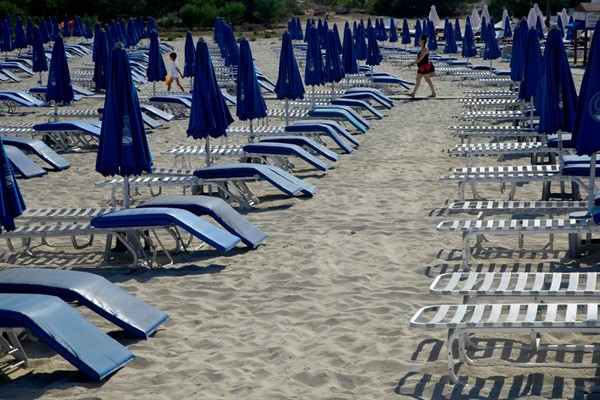 A nearly empty beach in the usually crowded resort town of Ayia Napa, Cyprus, July 20, 2020 (AP photo by Petros Karadjias).