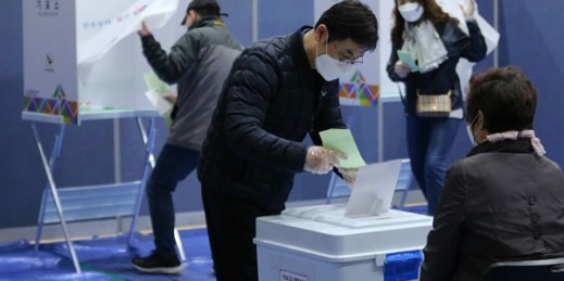 A man casts his vote for the parliamentary election at a polling station in Seoul, South Korea, April 15, 2020 (AP photo by Ahn Young-joon).