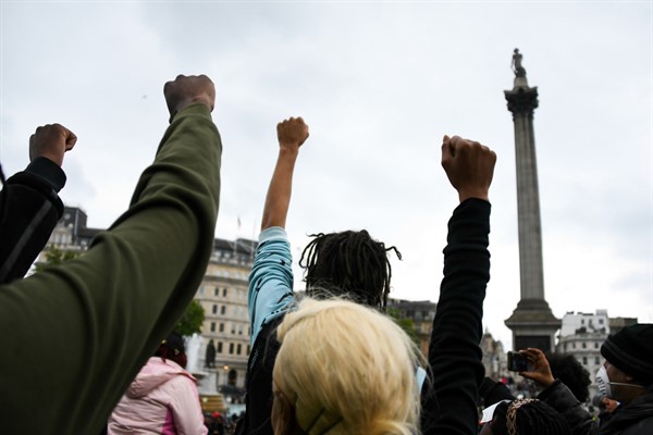 People gather in Trafalgar Square during a Black Lives Matter rally in London, June 12, 2020 (AP photo by Alberto Pezzali).