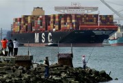 A cargo ship prepares to dock in Oakland, California, April 16, 2020 (AP photo by Ben Margot).