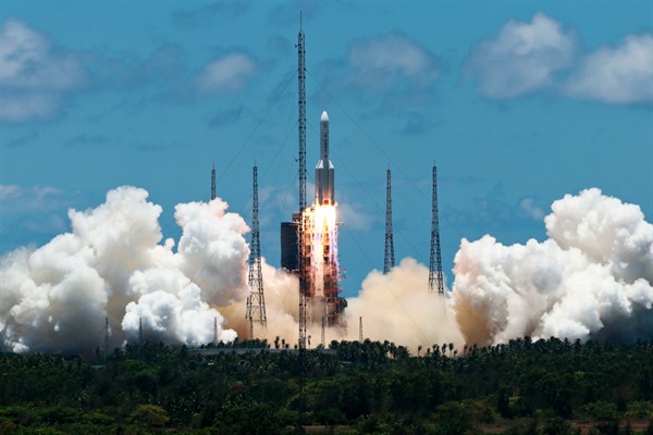 A CZ-5 rocket, carrying China’s first Mars explorer, lifts off from Wenchang Satellite Launch Center in Hainan province, southern China, July 23, 2020 (FeatureChina photo by Yi Wei via AP).