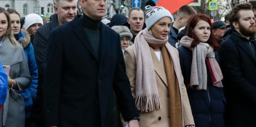 Russian opposition leader Alexei Navalny, center left, and his wife Yulia, during a march in Moscow, Russia, March 29, 2020 (AP photo by Pavel Golovkin).