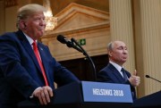 Russian President Vladimir Putin and U.S. President Donald Trump give a joint news conference at the Presidential Palace in Helsinki, Finland, July 16, 2018 (AP photo by Pablo Martinez Monsivais).