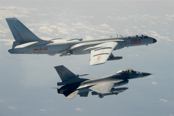 A Taiwanese Air Force F-16, in the foreground, flies on the flank of a Chinese People’s Liberation Army Air Force H-6 bomber as it passes near Taiwan, Feb. 10, 2020 (Republic of China (Ministry of National Defense photo via AP Images).