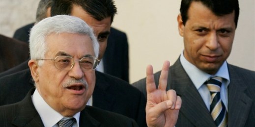 Palestinian Authority President Mahmoud Abbas, left, and then-Fatah official Mohammed Dahlan in the West Bank town of Ramallah, Dec. 18, 2006 (AP photo by Kevin Frayer).