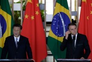 Brazilian President Jair Bolsonaro and his Chinese counterpart, Xi Jinping, deliver statements at the 11th BRICS Summit, in Brasilia, Brazil, Nov. 13, 2019 (AP photo by Eraldo Peres).
