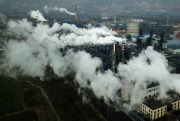 Smoke and steam rise from a coal processing plant in Hejin, China, Nov. 28, 2019 (AP photo by Sam McNeil).
