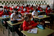 Students attend their first day of class since the pandemic paralyzed Spain six months ago, in Pamplona, Spain, Sept. 7, 2020 (AP photo by Alvaro Barrientos).