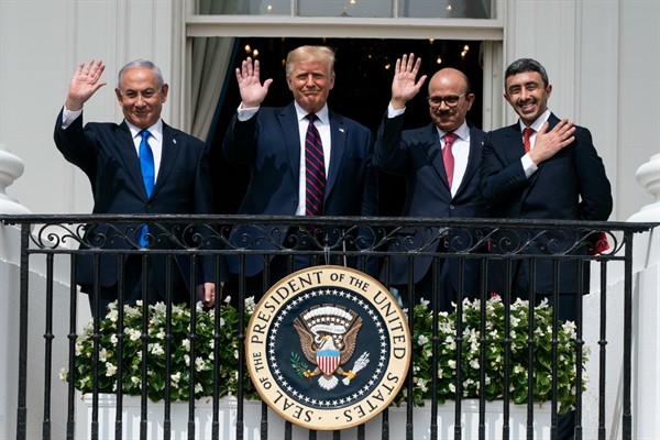 Israeli Prime Minister Benjamin Netanyahu, left, U.S. President Donald Trump and the foreign ministers from Bahrain and the United Arab Emirates after signing the Abraham Accords in Washington, Sept. 15, 2020 (AP photo by Alex Brandon).