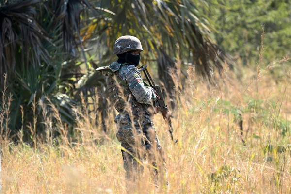 A Mozambican soldier Gorongosa National Park, about 170 kilometers from Beira, Mozambique, Thursday, Aug, 1, 2019 (AP photo by Tsvangirayi Mukwazhi).
