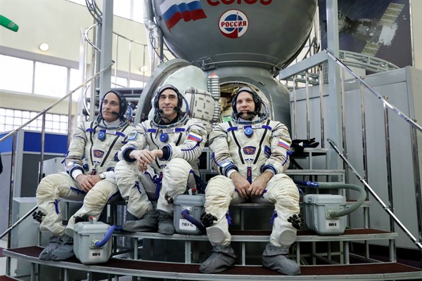American astronaut Christopher Cassidy, left, and Russian cosmonauts Anatoly Ivanishin and Ivan Vagner appear before their trip to the International Space Station, in Star City, Russia, March 12, 2020 (AP photo by Pavel Golovkin).