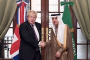 Boris Johnson, then serving as the U.K.’s foreign secretary, meets with Saudi Foreign Minister Adel al-Jubeir at the G20 summit of foreign ministers in Buenos Aires, Argentina, May 21, 2018 (Press Association photo by Stefan Rousseau via AP).