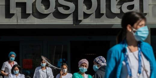 Medical staff and nurses gather during a protest at La Paz hospital in Madrid, Spain, Oct. 5, 2020 (AP photo by Manu Fernandez).