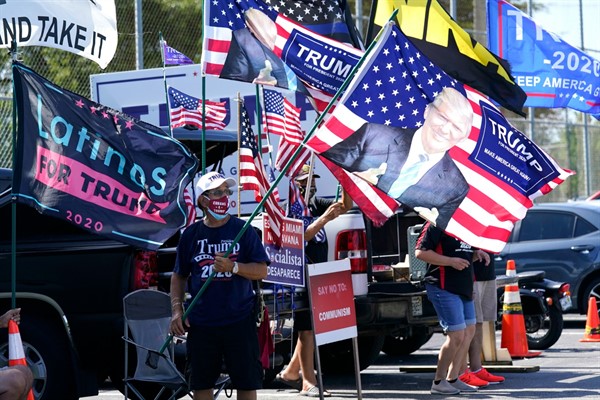 Supporters of President Donald Trump’s reelection campaign rally outside of an early voting location in Hialeah, Fla., Oct. 27, 2020 (AP photo by Lynne Sladky).