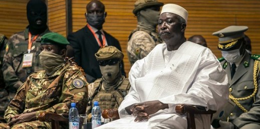 Former Defense Minister Bah N’Daw, right, is sworn in as transitional president, and Col. Assimi Goita, left, head of the junta that staged the August coup, is sworn as transitional vice president, in Bamako, Mali, Sept. 25, 2020 (AP photo).