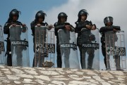 Mexican National Guard troops stand guard at Las Pilas dam in Camargo, Mexico, Sept. 10, 2020 (AP photo by Christian Chavez).