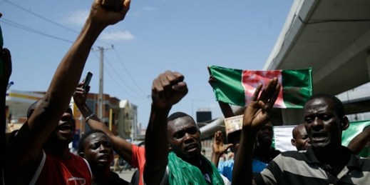 People protest against police brutality in Lagos, Nigeria, Oct. 20, 2020 (AP photo by Sunday Alamba).