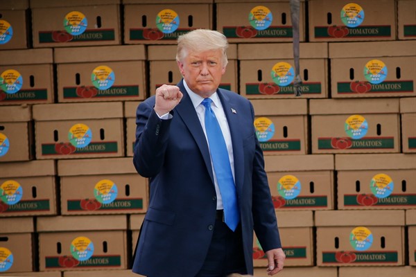 President Donald Trump arrives to speak about the U.S. Department of Agriculture’s Farmers to Families Food Box Program, at Flavor First Growers and Packers in Mills River, N.C., Aug. 24, 2020 (AP photo by Nell Redmond).