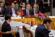 Chinese Foreign Minister Wang Yi, center back, attends the Special ASEAN-China Foreign Ministers’ meeting on the novel coronavirus in Vientiane, Laos, Feb. 20, 2020 (AP photo by Sakchai Lalit).