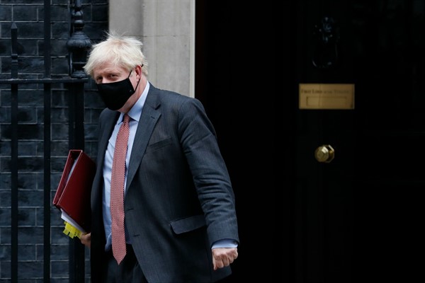 British Prime Minister Boris Johnson leaves 10 Downing Street, London, Sept. 30, 2020 (AP photo by Alastair Grant).