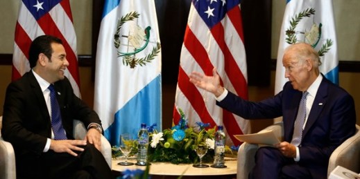 Then-U.S. Vice President Joe Biden, right, speaks with Jimmy Morales, Guatemala’s president-elect at the time, in Guatemala City, Jan. 14, 2016 (AP photo by Moises Castillo).