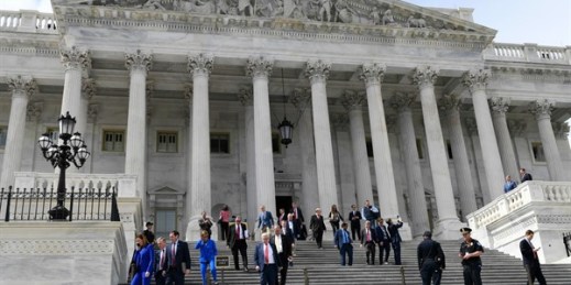 Members of the House of Representatives walk down the steps of Capitol Hill after passing a coronavirus rescue package, Washington, March 27, 2020 (AP photo by Susan Walsh).