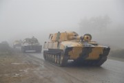 Armenian self-propelled artillery units during the withdrawal of Armenian troops from the separatist region of Nagorno-Karabakh, Nov. 18, 2020 (AP photo by Sergei Grits).