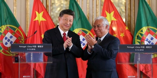 Chinese leader Xi Jinping and Portuguese Prime Minister Antonio Costa applaud after the signing of agreements between the two countries, in Queluz, Portugal, Dec. 5, 2018 (AP photo by Armando Franca).