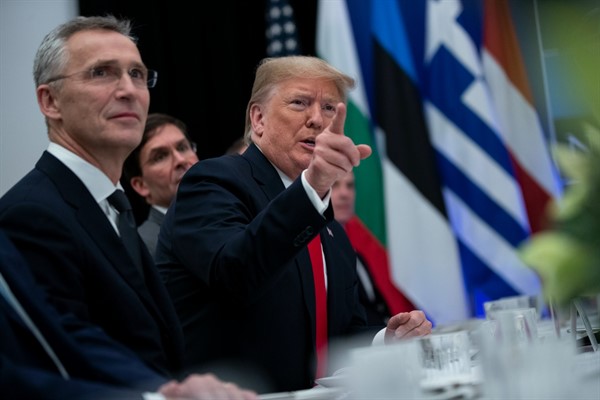 President Donald Trump speaks during a working lunch with NATO members in Watford, England, Dec. 4, 2019, (AP photo by Evan Vucci).