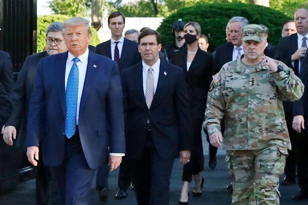 President Donald Trump departs the White House to visit St. John’s Church with then-Secretary of Defense Mark Esper, middle, and Gen. Mark Milley, chairman of the Joint Chiefs of Staff, right, in Washington, June 1, 2020 (AP photo by Patrick Semansky).