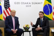 President Donald Trump and Brazilian President Jair Bolsonaro during a meeting on the sidelines of the G-20 summit in Osaka, Japan, June 28, 2019 (AP photo by Susan Walsh).