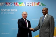 Russian President Vladimir Putin and the president of Sudan’s Sovereignty Council, Abdel Fattah al-Burhan, at the Russia-Africa summit in Sochi, Russia, Oct. 23, 2019 (TASS pool photo by Gavriil Grigorov via AP).