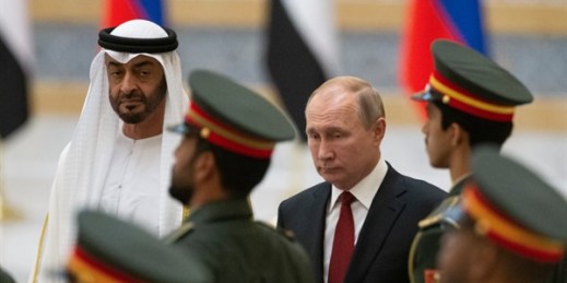 Russian President Vladimir Putin and Abu Dhabi Crown Prince Mohamed bin Zayed Al Nahyan attend an official welcome ceremony in Abu Dhabi, United Arab Emirates, Oct. 15, 2019 (AP photo by Alexander Zemlianichenko).