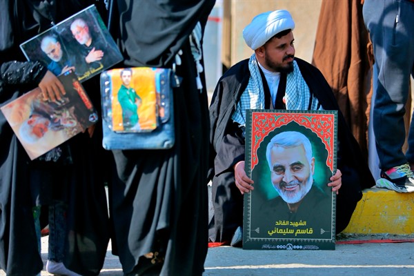 Supporters of the Iranian-backed Popular Mobilization Forces commemorate the anniversary of the killing of Iranian Maj. Gen. Qassem Soleimani in Najaf, Iraq, Jan. 4, 2021 (AP photo by Anmar Khalil).
