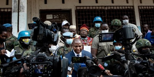 President Faustin-Archange Touadera, center, speaks to the media after casting his vote in Bangui, Central African Republic, Dec. 27, 2020 (AP photo).
