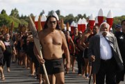 Maori canoeists mark the 175th anniversary of the signing of New Zealand’s founding document, the Treaty of Waitangi, at a march in Waitangi, New Zealand, Feb. 5, 2015 (AP photo by Nick Perry).