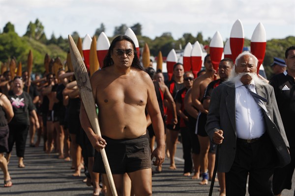 Maori canoeists mark the 175th anniversary of the signing of New Zealand’s founding document, the Treaty of Waitangi, at a march in Waitangi, New Zealand, Feb. 5, 2015 (AP photo by Nick Perry).
