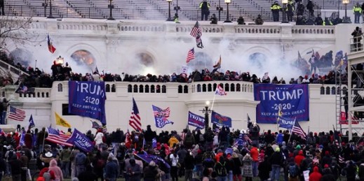 Violent protesters loyal to President Donald Trump storm the Capitol, in Washington, Jan. 6, 2021 (AP photo by John Minchillo).