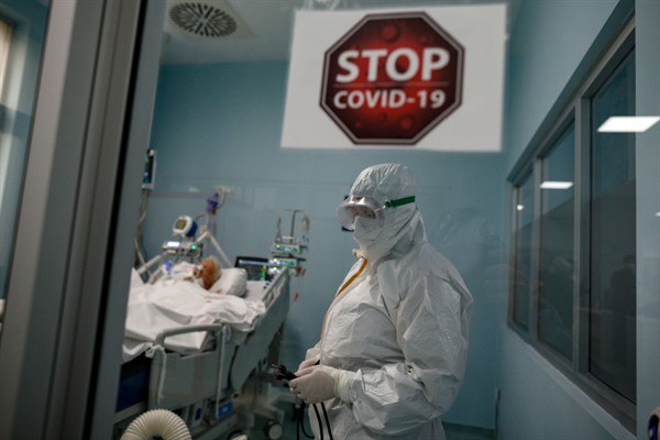 A nurse tends to a COVID-19 patient at a hospital in Istanbul, Turkey, Dec. 19, 2020 (AP photo by Emrah Gurel).