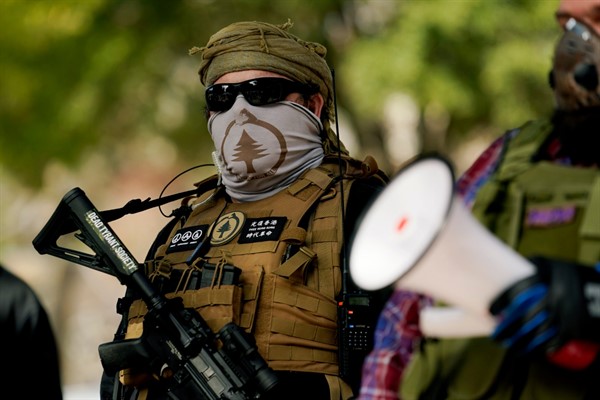 Armed demonstrators outside the locked gates of the Texas State Capitol, Austin, Texas, Jan. 17, 2021 (AP photo by Eric Gay).