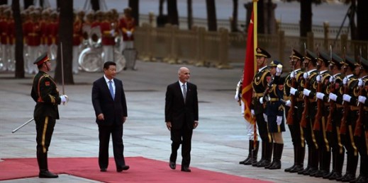 Afghan President Ashraf Ghani, center, and Chinese President Xi Jinping during a welcome ceremony in Beijing, Oct. 28, 2014 (AP photo by Andy Wong).