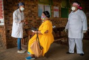 A woman is briefed before taking a COVID-19 test in Groblersdal, South Africa, Feb. 11, 2021 (AP photo by Jerome Delay).