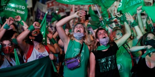Abortion rights activists celebrate after Congress approved a bill that legalizes abortion, Buenos Aires, Argentina, Dec. 30, 2020 (AP photo by Natacha Pisarenko).