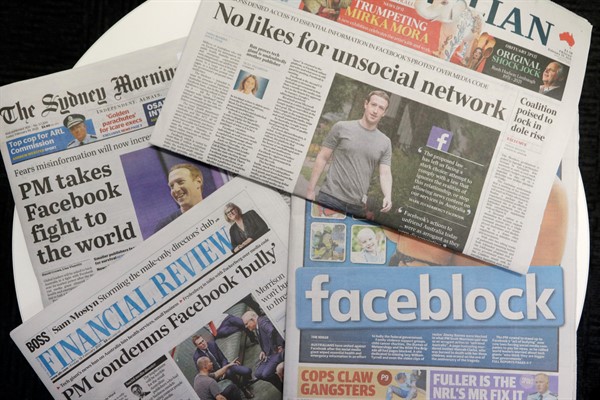 Front pages of Australian newspapers featuring stories about Facebook, in Sydney, Feb. 19, 2021 (AP photo by Rick Rycroft).