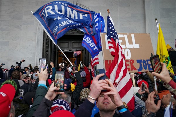 Trump supporters gather outside the Capitol in Washington, Jan. 6, 2021 (AP photo by John Minchillo).